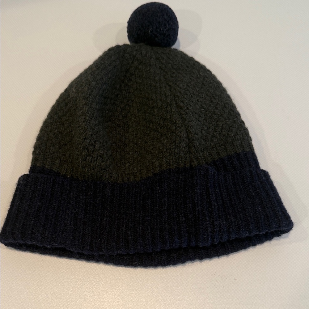 Agnes B. Olive Green and Navy Knit Beanie hat; 100% wool.